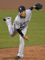 Tanaka blanks Orioles over 8 in Yankees' 10-inning loss