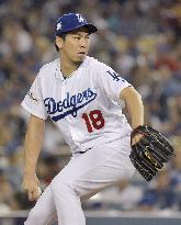 Maeda earns win in relief as Dodgers take NLCS opener