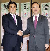(CORRECTED) Japan, S. Korea affirm cooperation in historically