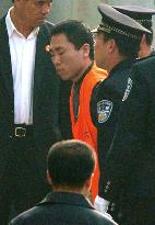 (1)Chinese court holds hearing for 2 charged in Fukuoka murder