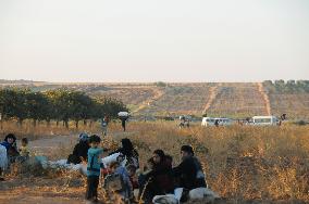 Group of Syrians rests after illegally entering Turkey