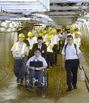 People evacuate in Seikan Tunnel disaster drill