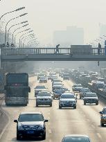 Vehicle restrictions in smog-hit Beijing