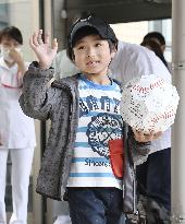 Japanese boy who survived alone in forest leaves hospital