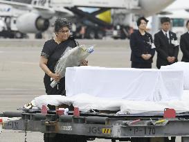 Bodies of Dhaka terrorist attack victims arrive in Japan