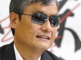 Activist Chen attends interview in Tokyo