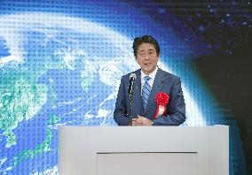 Abe at ceremony marking start of satellite operations