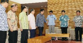Japanese ministers in Okinawa shirts