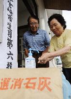 Voting under way in Japan's 1st election since change of gov't