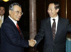 Japan, China ruling parties boost ties over N. Korea