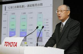 Toyota halves FY 2011 net profit forecast