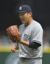 Tanaka earns 3rd win in comeback