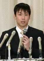 Tomita not to appeal guilty ruling
