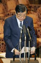 Abe aide apologizes for remarks on security bills