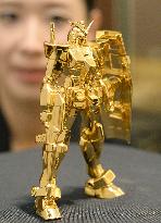 Pure-gold Gundam figurine on display in Osaka
