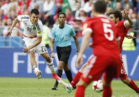 Soccer: Mexico reach Confederations Cup semis
