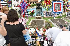 Fans visit Elvis Presley's grave ahead of 40th death anniversary