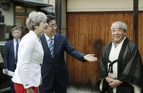 British PM May lands in Japan to talk N. Korea, trade with Abe