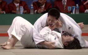 (1) China's Tong wins in women's judo
