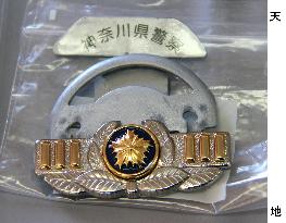 Confiscated fake police rank badge displayed in Yokohama