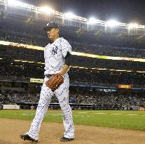 Yankees' Tanaka gets season's 1st win