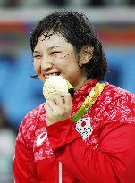 Olympics: Dosho with her gold in women's wrestling