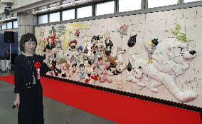 Relief with Osamu Tezuka's cartoon characters