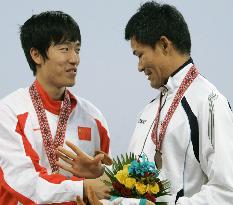 Athens champion Liu storms to gold in 110 hurdles