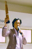 Traditional Japanese flute player collaborates with diamond shop