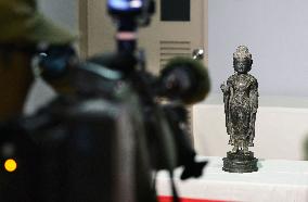 Stolen Buddhist statue arrives from South Korea