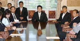 Abe to explain within days about sales tax postponement