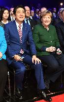 Japan PM calls for German help in promoting free trade