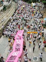 (CORRECTED)People mark H.K. handover anniversary