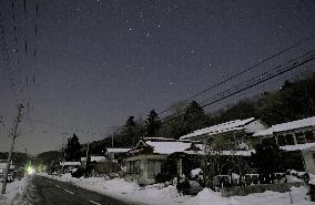Fukushima village calls on evacuees to return home
