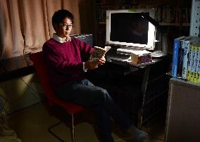 Heir to time-honored Japanese confectioner also writes novels