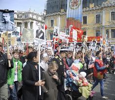 Russian citizens participate in war victory parade in Vladivostok