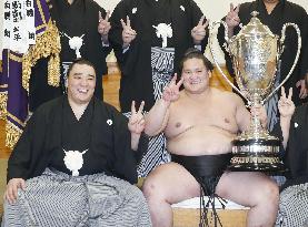 Terunofuji poses with yokozuna as winner of summer sumo tourney