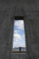 Giant coastal levee in response to quake-tsunami in Japan