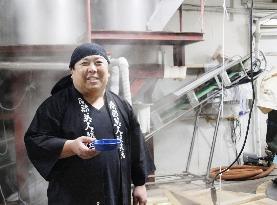 Japanese brewery tries AI-assisted sake making
