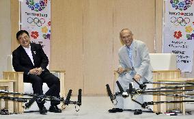 Tokyo Olympics minister meets with Tokyo governor