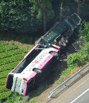 Lorry and coach crash off highway in central Japan