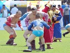 Mongolian wrestlers fight as sport festival starts