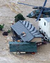 River flooding in eastern Japan leaves dozens of residents stranded