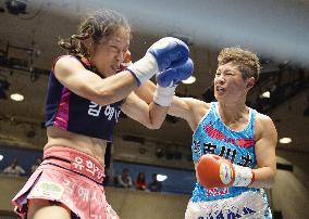 Japan's Fujioka wins WBO women's bantamweight title match