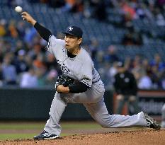 Tanaka blanks Orioles over 8 in Yankees' 10-inning loss