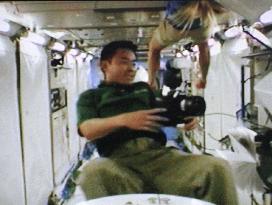 Japanese astronaut Hoshide works in Kibo space laboratory