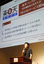 Rakuten's 1st-half earnings slump on poor financial business