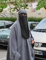 Muslim woman in France in full-face veil