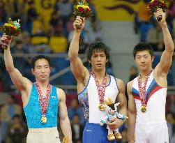 Tomita, Jo, Kim share gold in men's pommel horse