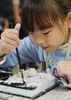 Miyagi children create diorama of devastated towns